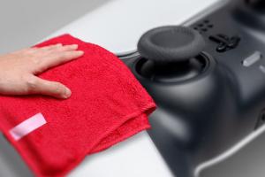 How to Safely Clean Your PlayStation 5: Intakes, Fan, and More