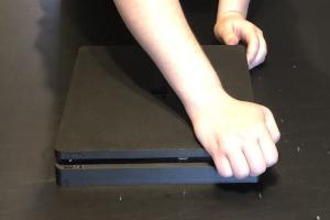 Ultimate Guide: Disassemble, Clean, and Reassemble Your PS4 Slim for Peak Performance