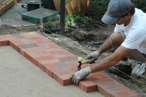 Mastering the Art of Brick Laying: Step-by-Step Guide to Creating a Stunning Brick Patio