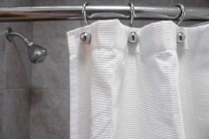 Ultimate Guide to Keeping Your Shower Curtain From Blowing In: Weights, Magnets & More